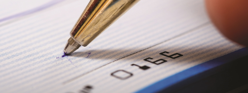 pen signing a check
